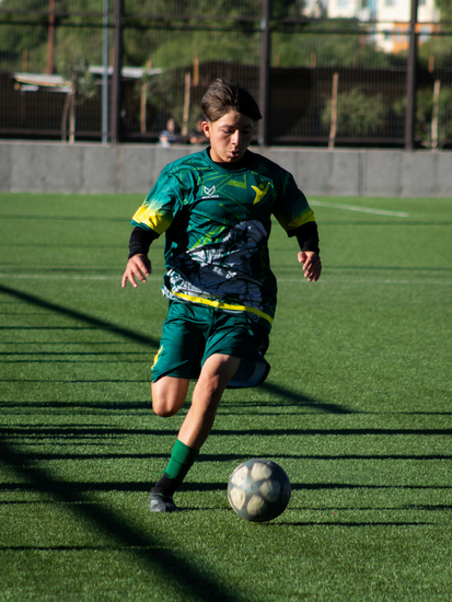 Young footballer on the pitch